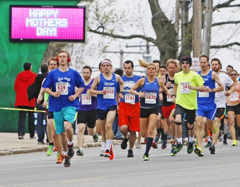 Runners take off at the Portland Sea Dogs Mother's Day 5K at Hadlock Field. Jill Brady/Staff Photographer