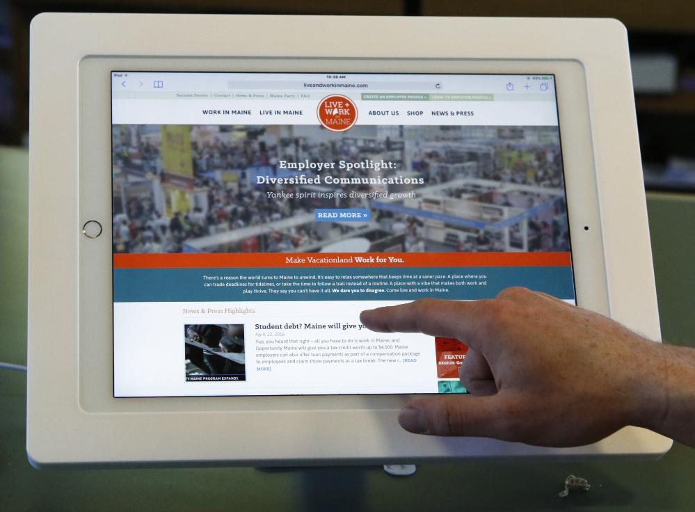 A Live + Work in Maine iPad is connected to the program's website, which lets a viewer pick a job category and look at companies offering jobs and internships in a selected region of the state.