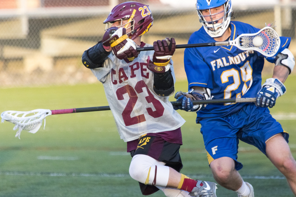 Cape Elizabeth senior Riley Pillsbury winds up to score the team's tenth goal against Falmouth on Wednesday. The Capers won the game, 11-9. (Photo by Ben McCanna/Staff Photographer)