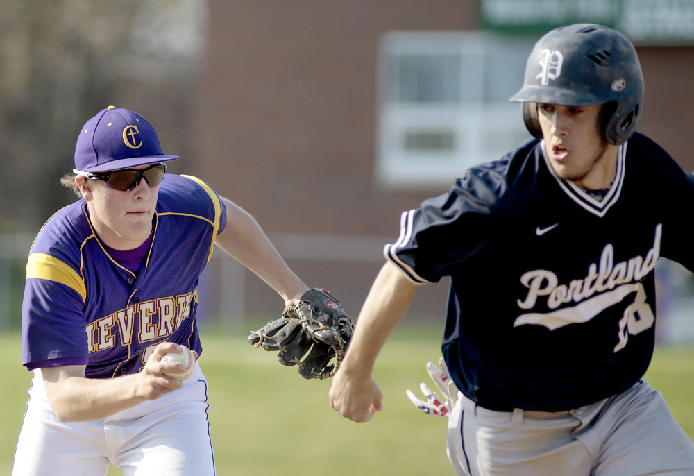 Jonathan Bernier of Cheverus runs down Charles Barnard of Portland, who was caught in a rundown during the fourth inning. Barnard pitched a complete game and also went 3 for 3, driving in three runs.