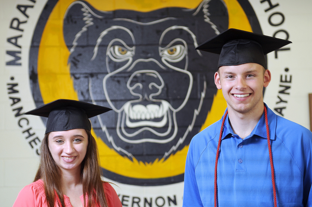 Amy Lapierre and Reid Lanpher will march at two graduations this spring: one for their associate degrees at Thomas College and the other for their high school diplomas at Maranacook Community High School.