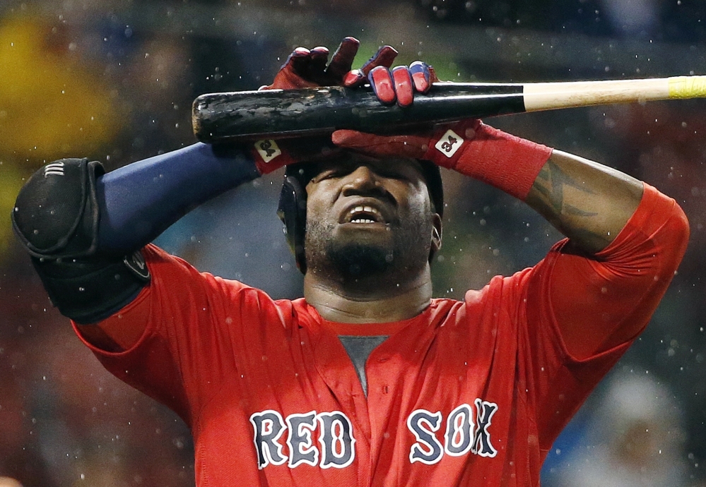 Boston's David Ortiz reacts after flying out in the seventh inning of Friday's game at Fenway Park.