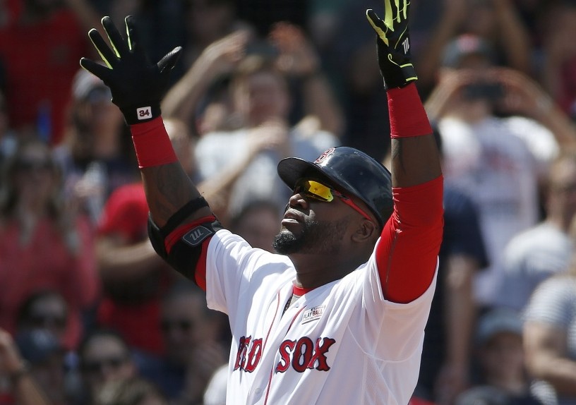 David Ortiz celebrates his solo home run during the third inning of a baseball game against the Houston Astros in Boston on Saturda. (AP Photo/Michael Dwyer)