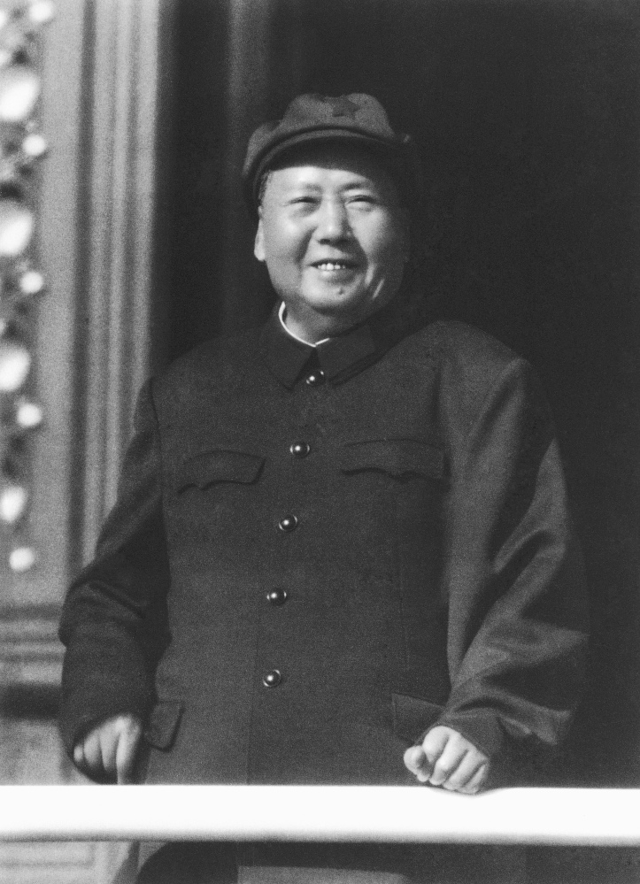 The Associated Press
Former Chinese leader Mao Zedong observes Cultural Revolution-inspired Red Guards assembled in Beijing's Tiananmen Square in 1966. On May 16, 1966, the Communist Party's Politburo produced a document announcing the start of what was formally known as the Great Proletarian Cultural Revolution to pursue class warfare and enlist the population in mass political movements. Launched by Mao, it set off a decade of tumult to revive communist goals and enforce a radical egalitarianism.