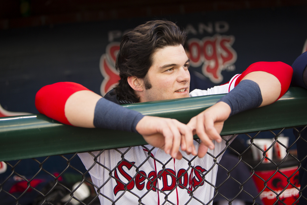 PORTLAND, ME - MAY 16: Portland Sea Dogs outfileder Andrew Benitendi looks on from the dug out, while the team was at bat, during a game against the New Hampshire Fisher Cats on Monday, May 16, 2016. Benintendi went 0-4.(Photo by Carl D. Walsh/Staff Photographer)