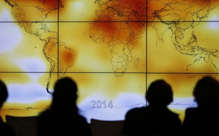 A world map showing climate anomalies is presented at the 2015 Paris climate change conference. 
