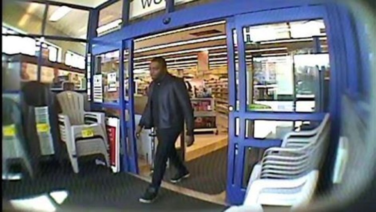 Police believe this photo taken April 30 by a surveillance camera at the Rite Aid store on China Road in Winslow shows a possible member of the Felony Lane Gang. The man allegedly used a stolen credit card to buy several prepaid credit cards.