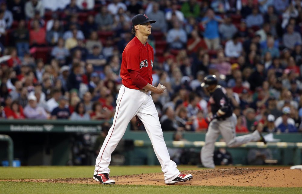 Boston's Clay Buchholz walks back to the mound after giving up a three-run home run to Cleveland's Jason Kipnis in the third inning of the Red Sox' 4-2 loss to Friday in Boston.