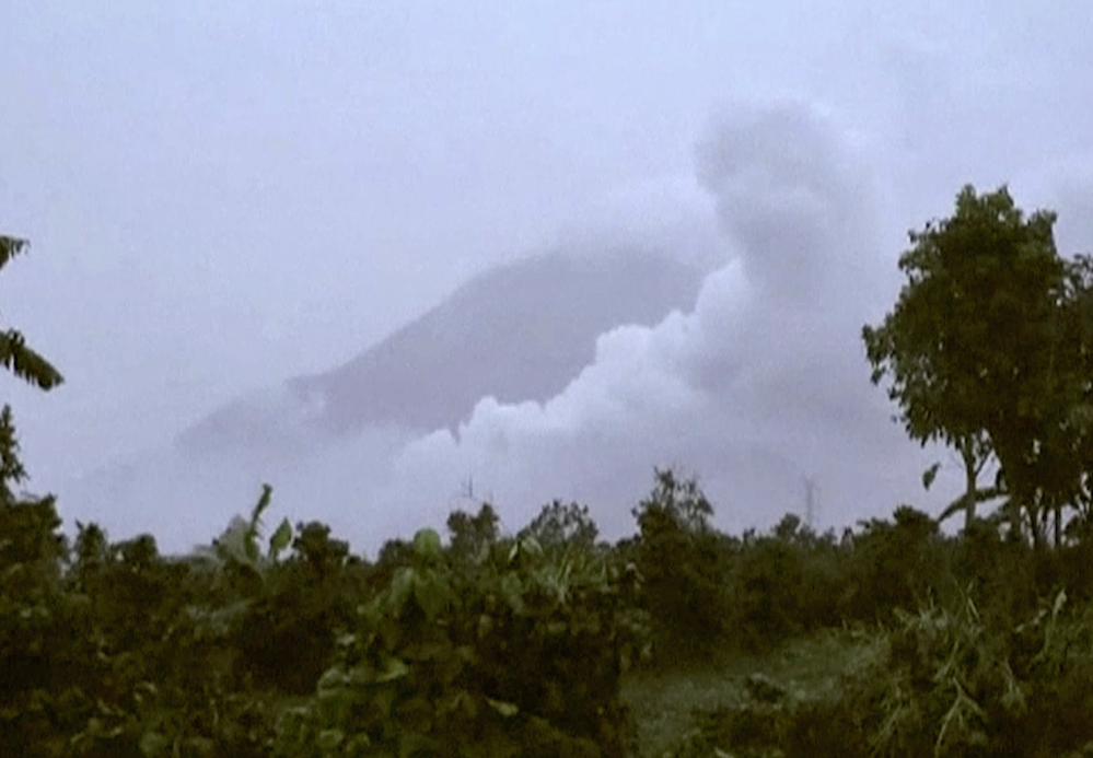 Clouds of ash rise from Mount Sinabung in North Sumatra, Indonesia, on Saturday. 