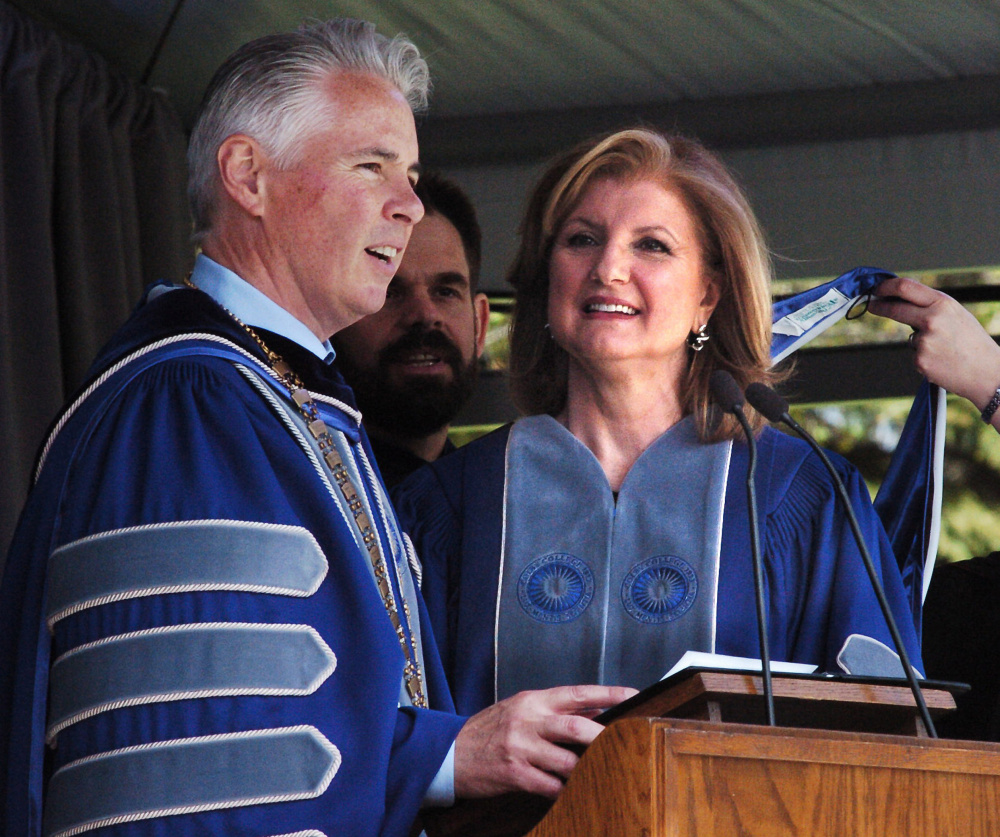 Colby College President David Greene confers an honorary degree of doctor of detters on commencement speaker Arianna Huffington, co-founder of the Huffington Post, on Sunday.