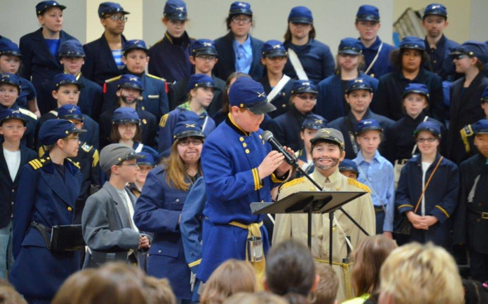 Students from Brunswick's Harriet Beecher Stowe School appear at a Civil War-themed event. The 20-year practice of re-creating Pickett's Charge with fifth-graders will end this week.