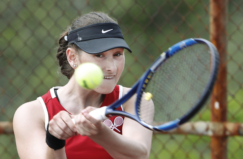 Scarborough's Megan Nathanson returns a shot during her 6-0, 6-0 win in the No. 1 singles match Monday against Gorham. Scarborough won a clash of unbeaten teams, 4-1, to end the regular season with a 12-0 record.
