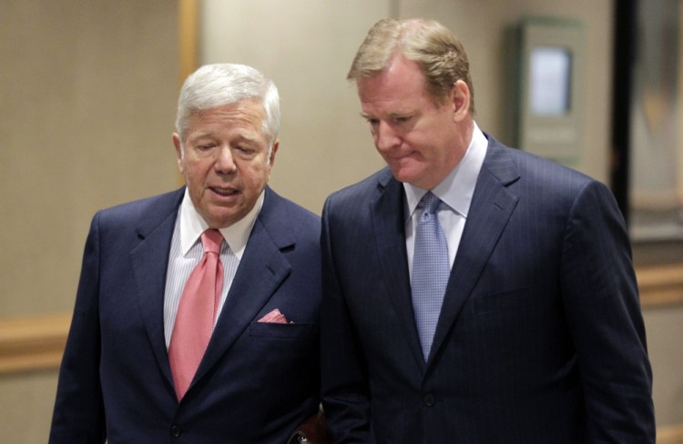 Robert Kraft, owner of the New England Patriots, left, talks with NFL Commissioner Roger Goodell while arriving at the NFL football owners meetings in 2011. Kraft and the Patriots joined Tom Brady in appealing Brady's four-game suspension, but the commissioner prevailed, though he's not a winner in Deflategate.  The Associated Press