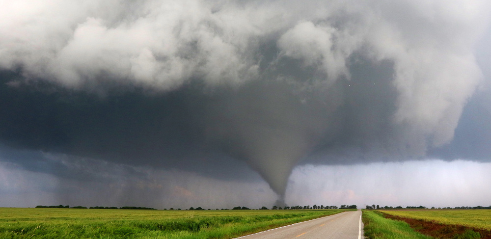 A tornado drops two mile northeast of Niles, Kan., on Wednesday. The large tornado that the National Weather Service said was on the ground for about 90 minutes damaged or destroyed about 20 homes in northern Kansas.
