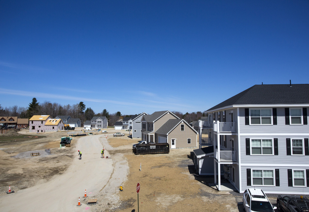 Construction is underway on new homes in a Westbrook development. The April report from the Maine Association of Realtors said home sales had spiked nearly 25 percent over April 2015 sales. Unfortunately, prices rose only slightly – 1.1 percent – to a statewide median of $180,000. Derek Davis/Staff Photographer
