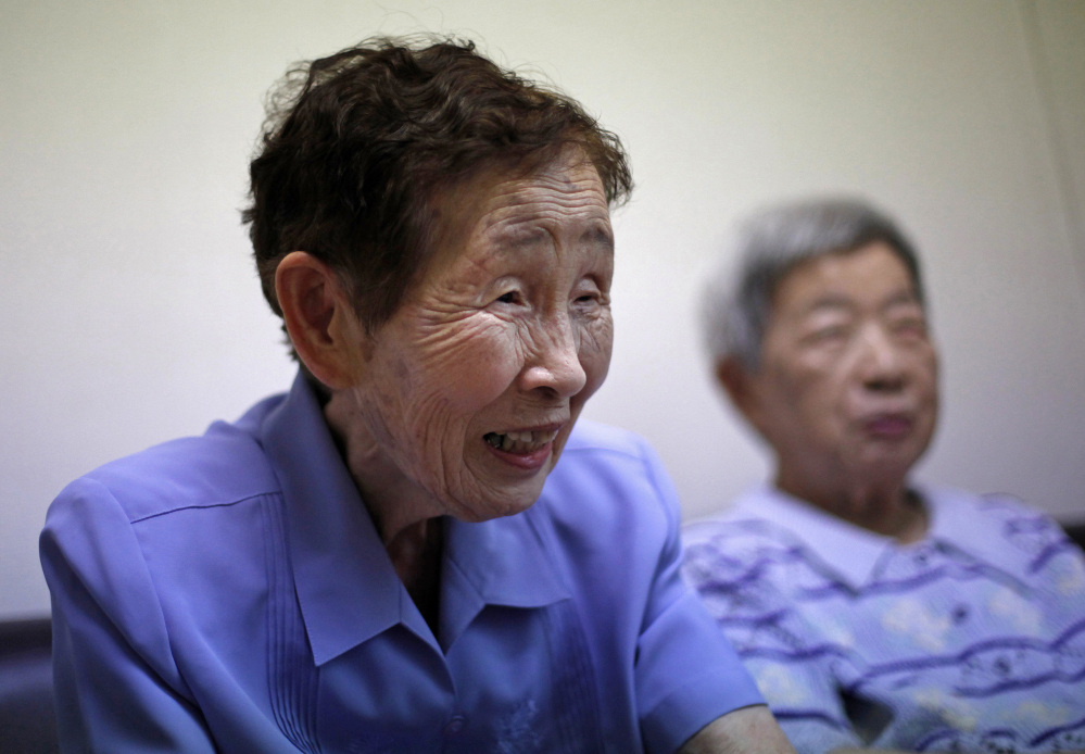 Bomb survivor Kimie Miyamoto, 89, left, says "The world paid attention to what happened" in Hiroshima because President Obama visited. "But you never know if it will make a difference ... ." At right is another bomb survivor, 89-year-old Michiko Kimoto.