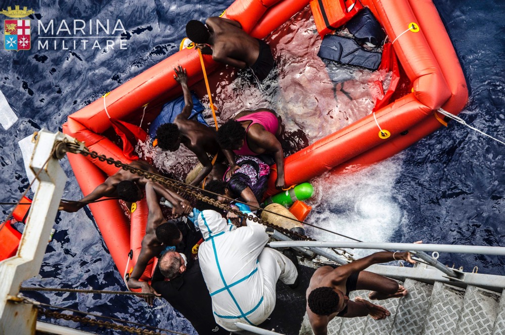 Rescuers help migrants board the Italian Navy ship Vega on Friday in the Mediterranean Sea after the boat they were aboard sank. They face an uncertain future but their fate is better that of than some who attempted the journey. Authorities say in the past few years many migrant boats have sunk without a trace in the Mediterranean, with the dead never found.