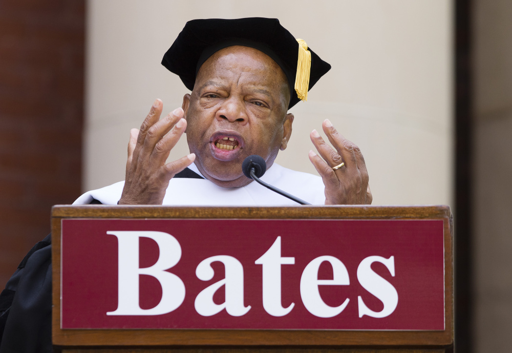 U.S. Rep. John R. Lewis, D-Ga., urges graduates to use their education as a tool to set "our little planet" free.