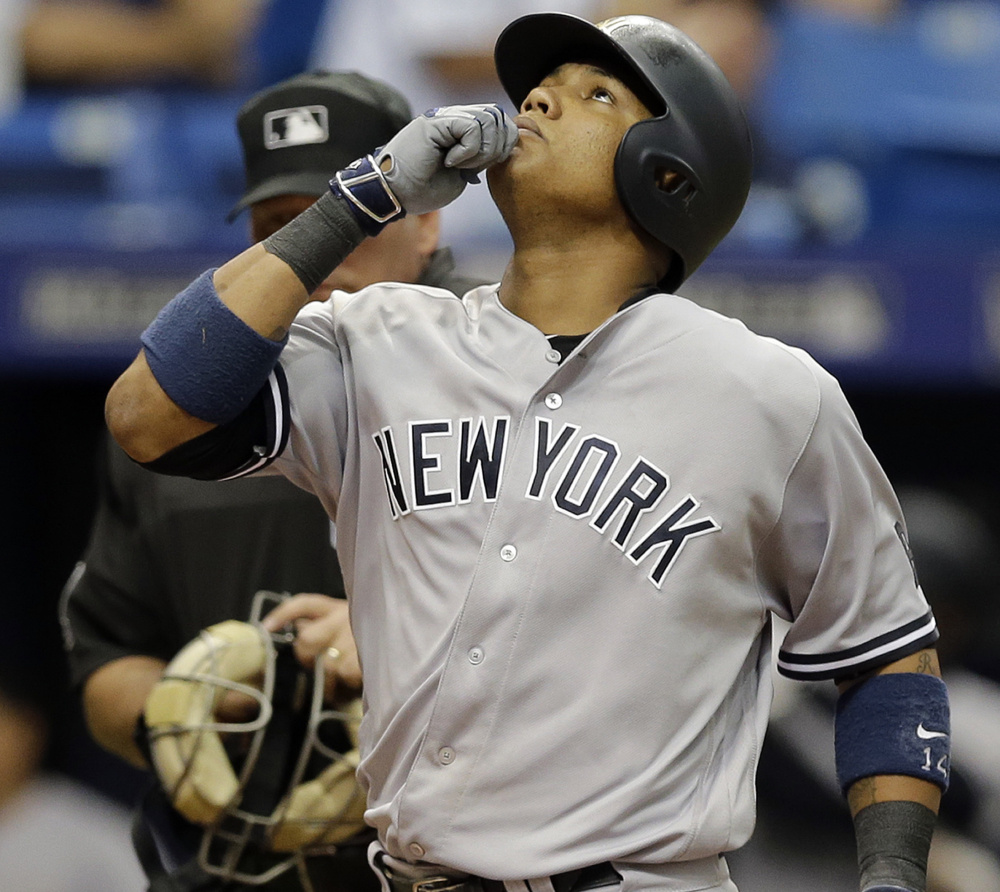 The Yankees' Starlin Castro crosses home plate after his two-run homer – the Yankees' only hit of the game – during a 2-1 win over Tampa Bay on Sunday.