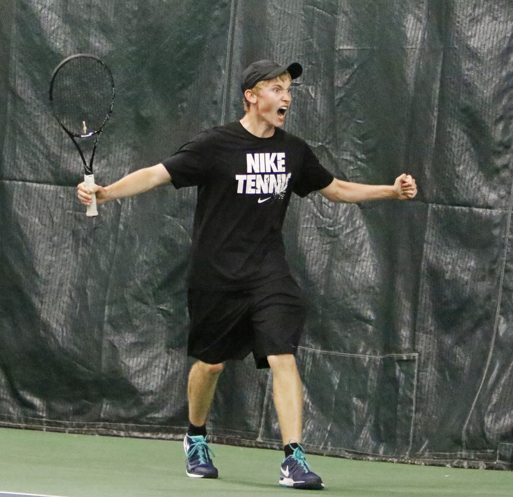 Mt. Ararat's Nick Mathieu celebrates after beating Dariy Vykhodtsev of Thornton Academy 6-4, 4-6, 6-2 to win the boys' singles tennis tittle on Monday at the Racket and Fitness Center.