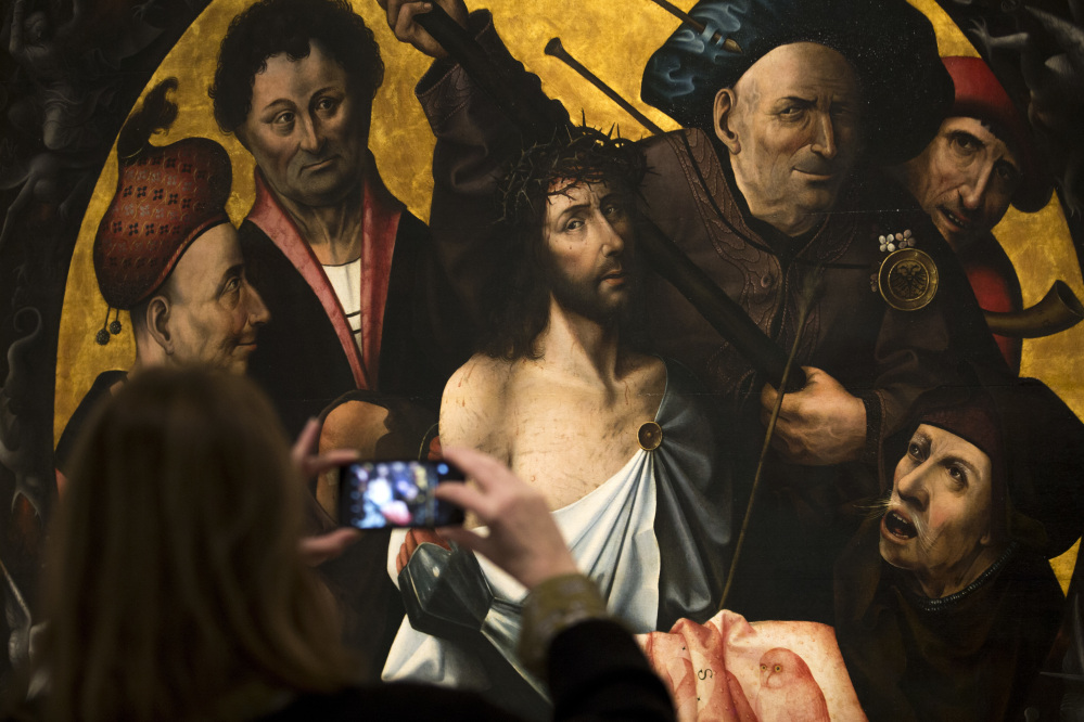 "The Passion" triptych painting is in a new Madrid exhibit featuring works by Dutch artist Hieronymus Bosch.