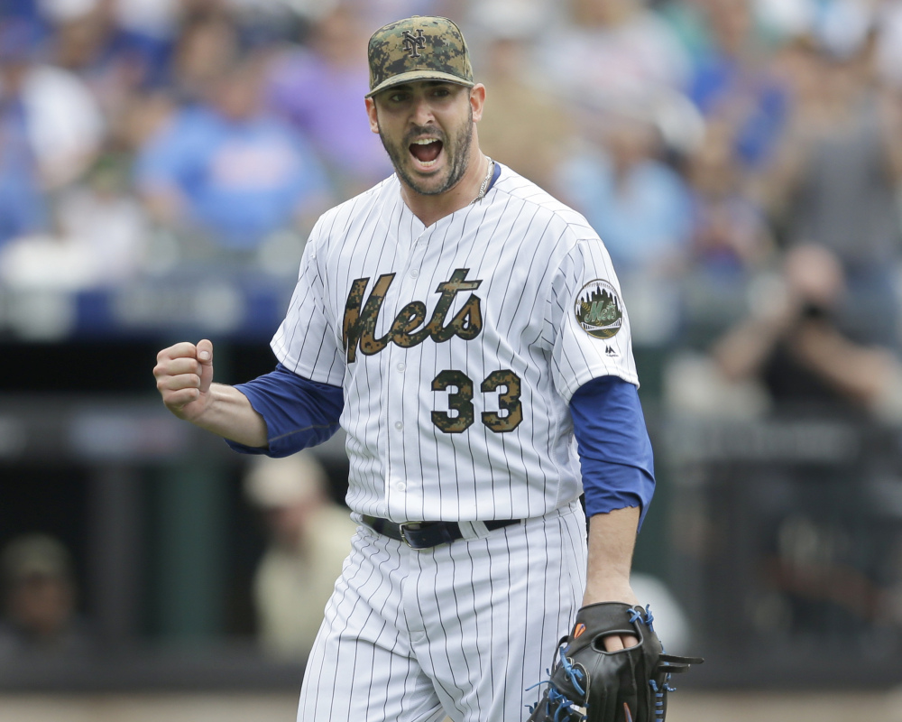 New York's Matt Harvey is pumped after escaping a jam in the seventh inning of a win Monday over the White Sox. It was Harvey's first victory since May 8.
