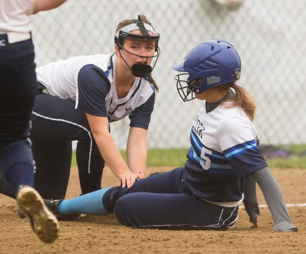 Yarmouth third baseman Hannan Merrill places the tag on York's Lexie York in Friday's softball game at Yarmouth.
Carl D. Walsh/Staff Photographer