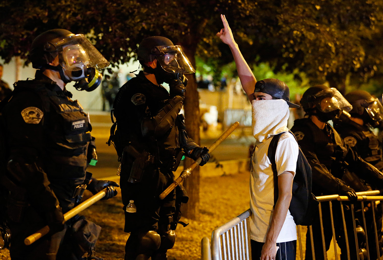 Riot police block off the Albuquerque Convention Center to anti-Trump protests following a rally and speech by Republican presidential candidate Donald Trump at the convention center where the event was held in Albuquerque.