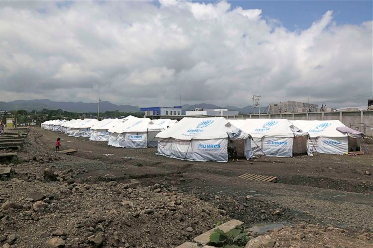 A tent village is set up for people displaced by last month's earthquake  in this In this May 15, 2016, photo. A month after the magnitude 7.8 earthquake many Ecuadorians are still struggling. The Associated Press