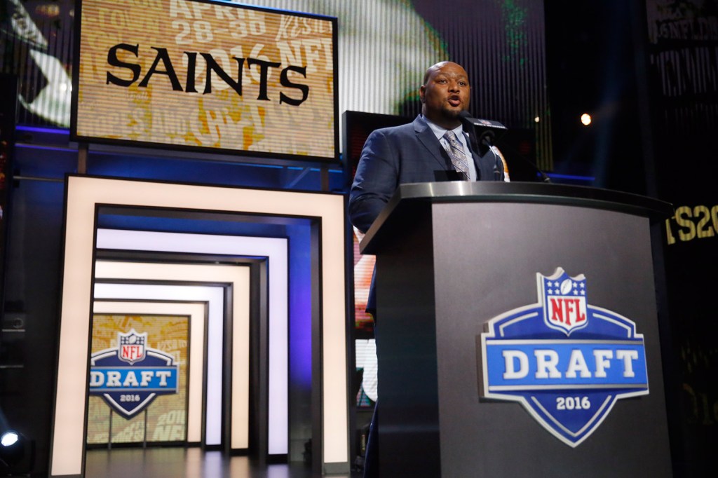 Former NFL player Deuce McAllister announces that the New Orleans Saints selects Ohio State's Michael Thomas as the 47th pick in the second round of the 2016 NFL football draft in Chicago. The Associated Press