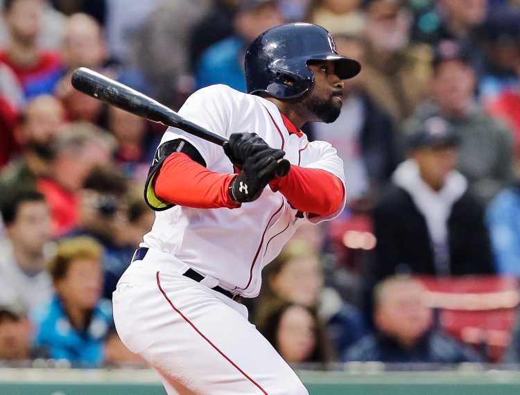 Jackie Bradley Jr. watches his double head toward the Green Monster during Boston's 8-3 win over Colorado on Tuesday. The double extended Bradley's hitting streak to 28 games.   The Associated Press