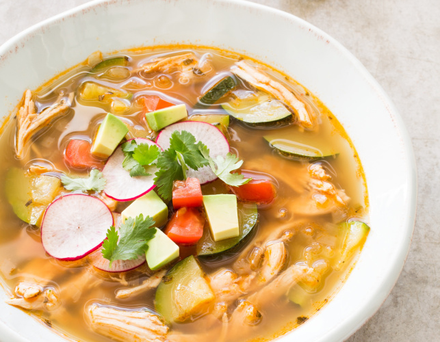 The chicken soup in "Paleo Perfected" packs all the flavor without the carbs, or corresponding calories. The heat from the spices and the jalapeño is balanced by the toppings.   Courtesy photo
