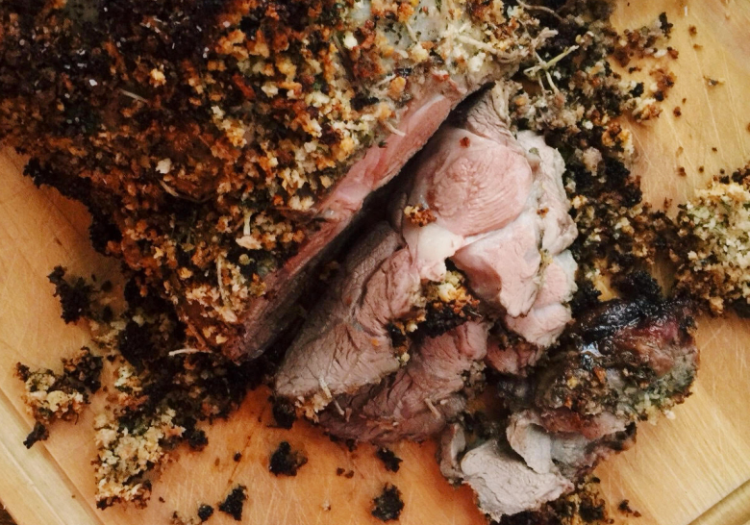 Herbed Leg of Lamb is seasoned with garlic, orange zest and herbs and marinated overnight.   The Associated Press