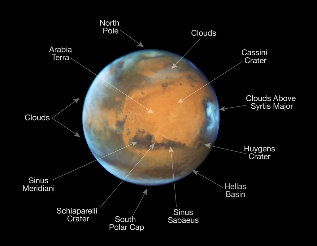 This image of Mars was taken by the NASA/ESA Hubble Space Telescope on Thursday, shortly before opposition. Some prominent features on the planet's surface are labeled.