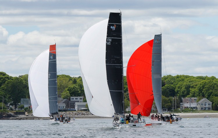 From left, Oakcliff (USA), Eärendil (France) and Tales II (Spain), sail toward Williard Beach in South Portland.