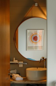 Art decorates every floor, and even this bathroom, at the new 250 Main Grand Hotel in Rockland.