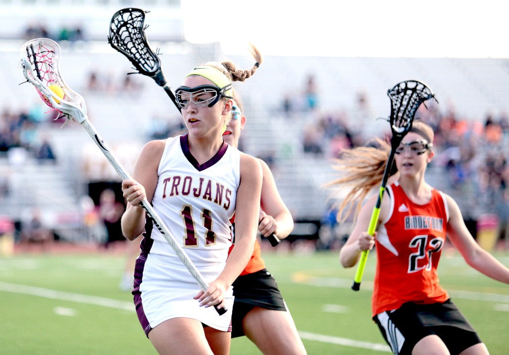 Thornton Academy's Tatum LeClair tries to elude defenders Peyton McKeown and Azure Illiano during a Class A South girls' lacrosse quarterfinal, on Wednesday.
Gabe Souza/Staff Photographer