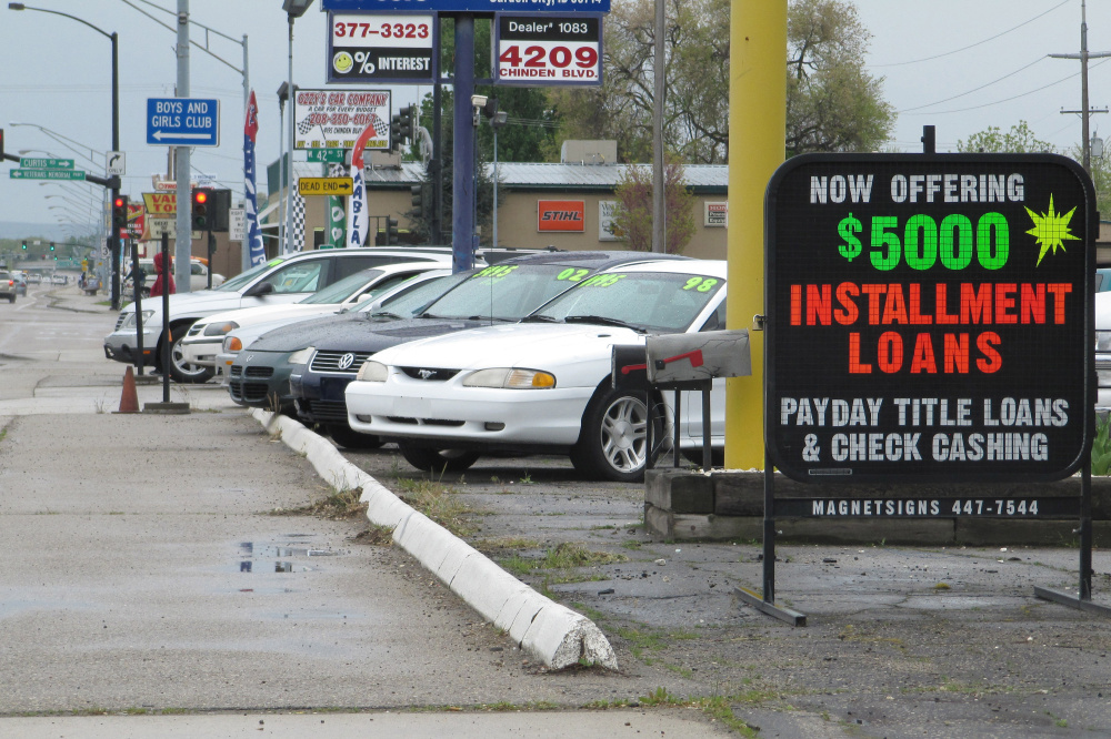 Payday loans are promoted in Boise, Idaho. Each year, roughly 12 million Americans take out a payday loan, according to The Pew Charitable Trust.