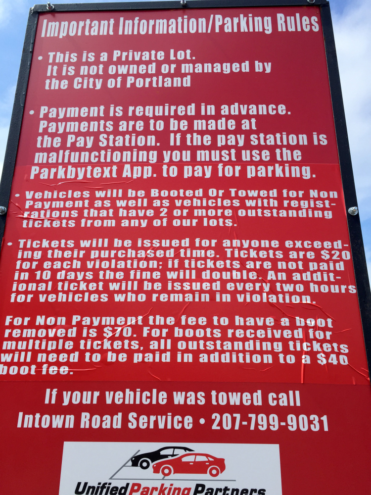 This sign is at a lot at Congress and Market streets in Portland. Photo by John Richardson/Staff