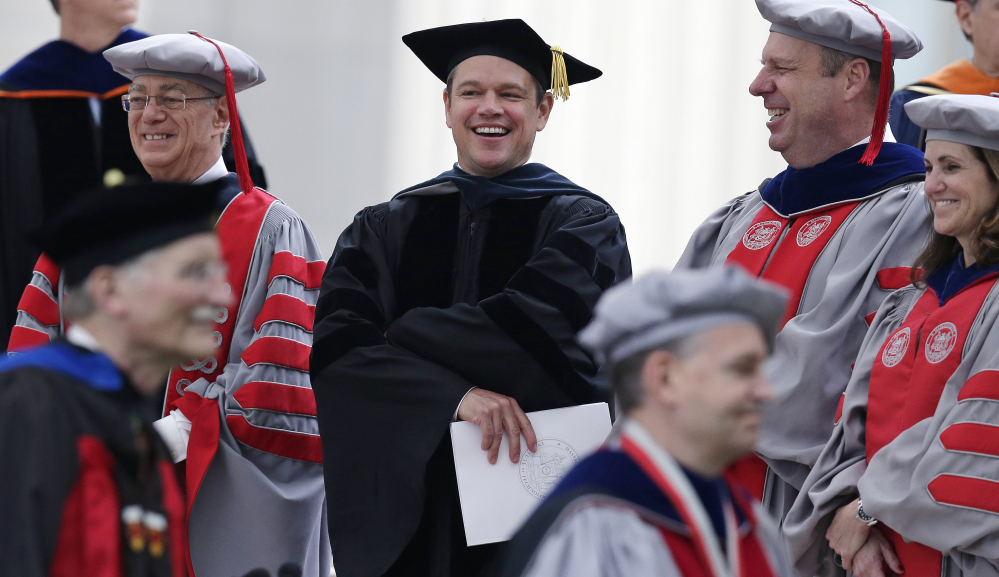 Actor Matt Damon joins the academic procession at the Massachusetts Institute of Technology's commencement in Cambridge, Mass., on Friday.