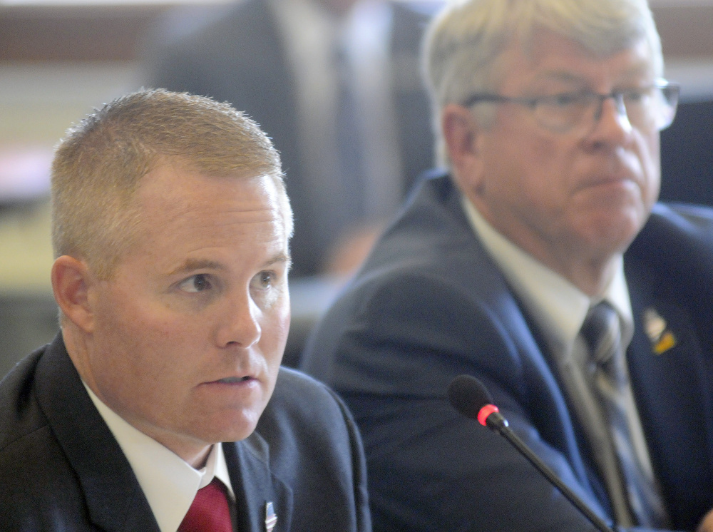 "I'm not going to put my officer under investigation because someone misprints false allegations" about the conduct of officers in undercover sting operations, Maine Warden Service Col. Joel Wilkinson, left, told a June 1 legislative hearing in Augusta. Lawmakers have no plans to look into any other allegations.