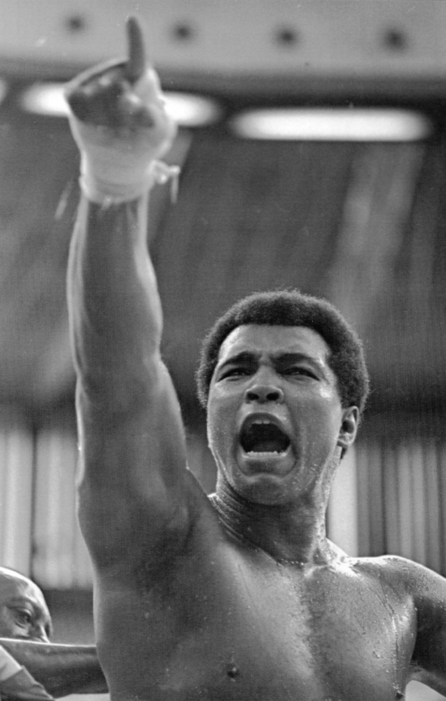 Muhammad Ali shouts "Joe Bugner must go!" to Malaysian fans before his 1975 fight against Bugner.