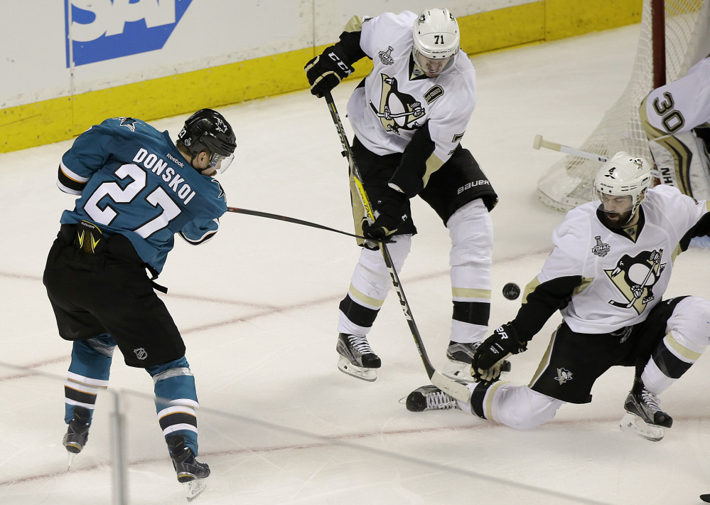San Jose's Joonas Donskoi scores the winning goal against the Pittsburgh Penguins during overtime of Game 3 of the Stanley Cup finals Saturday night in San Jose, California. The Sharks cut their series deficit to 2-1 with a 3-2 victory.