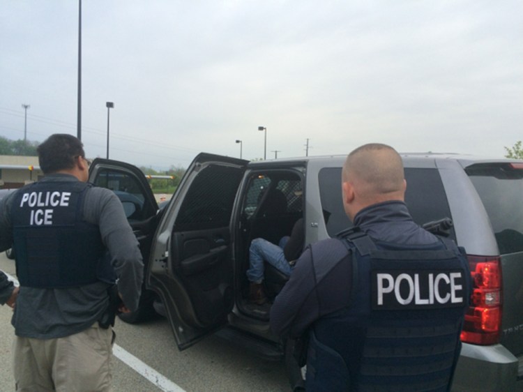 Enforcement and removal officers with U.S. Immigration and Customs Enforcement are shown in Philadelphia during an operation targeting criminal immigrants and other violators of immigration law, in an image released May 11. Understating the extent of recidivism by criminal immigrants hinders effective policymaking.