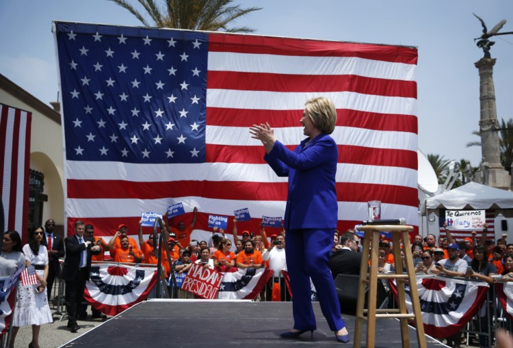 Democratic presidential candidate Hillary Clinton attends a rally on Monday in Lynwood, Calif. An Associated Press count finds that she has the delegate commitments needed to secure the party's nomination for president.