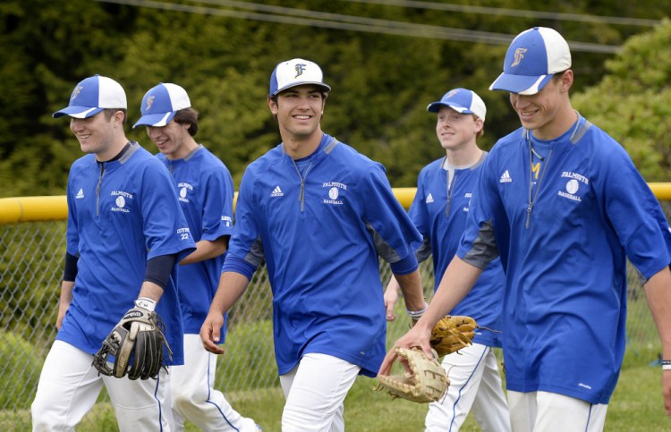 Connor Aube, center, is the unquestioned leader of a Falmouth High baseball team that completed an undefeated Western Maine Conference regular season and will face tougher competition in the playoffs.