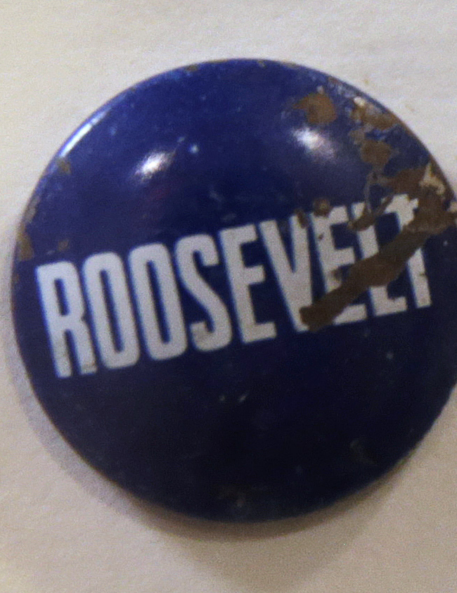 A Roosevelt campaign pin is displayed at Boston Children's Hospital in Boston, Wednesday, June 8, 2016. The items are part of a collection of items ingested by children, a gruesome reminder to dozens of parents who walk past them every day, at the entrance of the hospital's ear, nose and throat department. Children's doctor Anne Hseu says it catches the eye of parents and warns them to be careful of what their child is exposed to. (AP Photo/Charles Krupa)