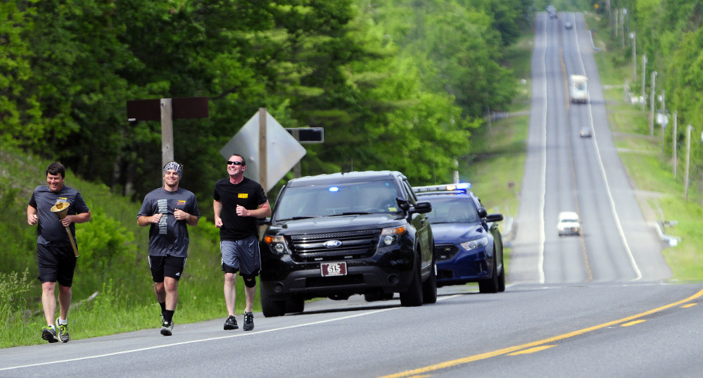 Law enforcement officers took part in the annual torch run for Special Olympics on Thursday, a prelude to the Special Olympics Maine State Summer Games meet this weekend in Orono.