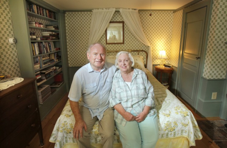 John and Kathy Daamen sit in a room they'd like to use for guests at the Waldo Emerson Inn in Kennebunk. The town's current zoning limits them to renting just four rooms.