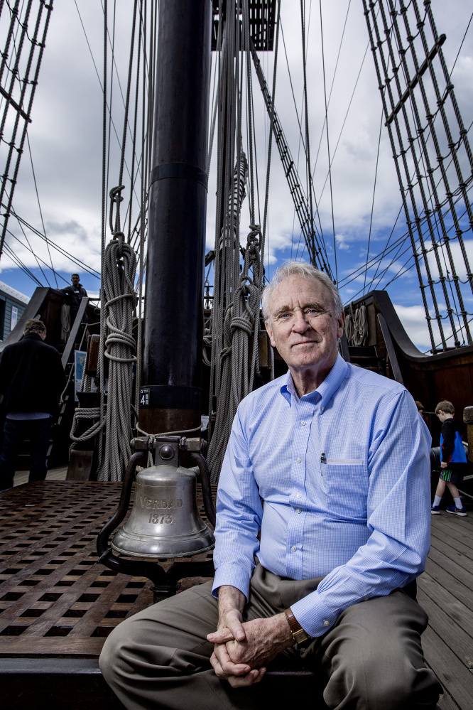 Aboard the Spanish tall ship El Galeon, Tom Cox poses with the bell he bought at a Wiscasset antiques store in 1979. He uncovered its origin as part of the 1899 wreck of a Spanish ship on a reef near Bermuda.